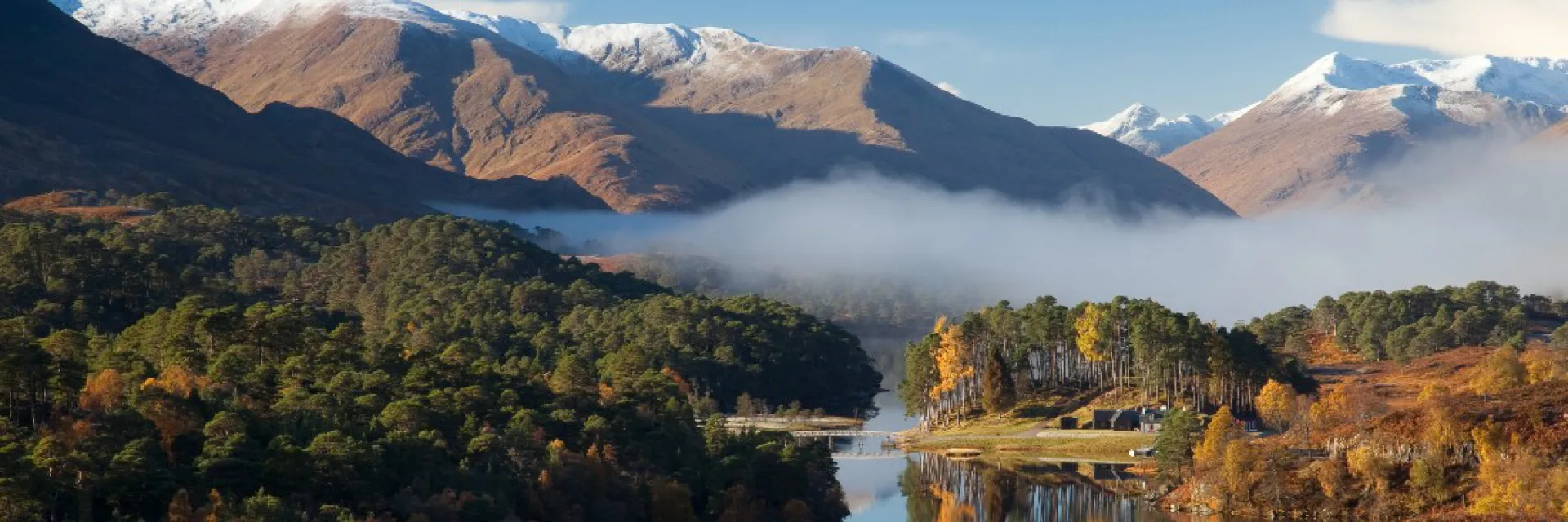 Snow capped mountains in Glen Affric
